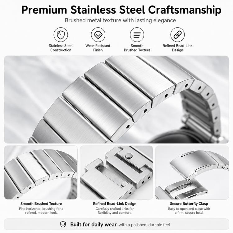 Close-up of brushed silver watch band links and butterfly clasp