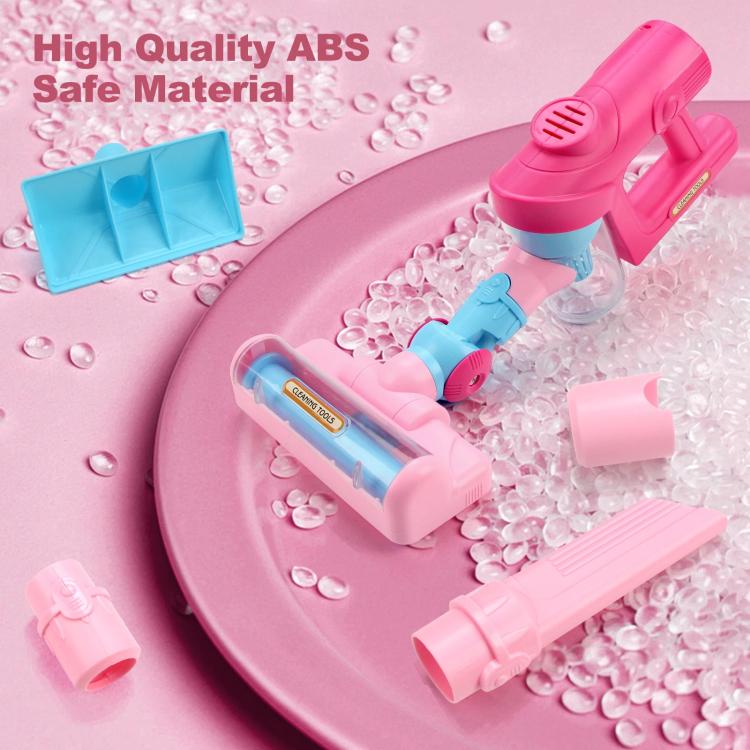 Pink and blue pretend vacuum cleaner toy with removable cleaning tool attachments
