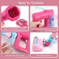 Pink electric pretend play vacuum cleaner toy showing open battery compartment and buttons