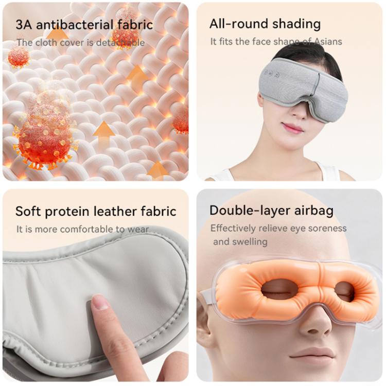 Gray fabric eye massager with stitched padding and breathable textured surface