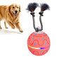 Interactive red-orange dog toy ball with blue pattern and two fuzzy spinning brush arms