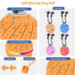 Self-moving dog toy ball with rope, orange patterned shell and colorful LED light