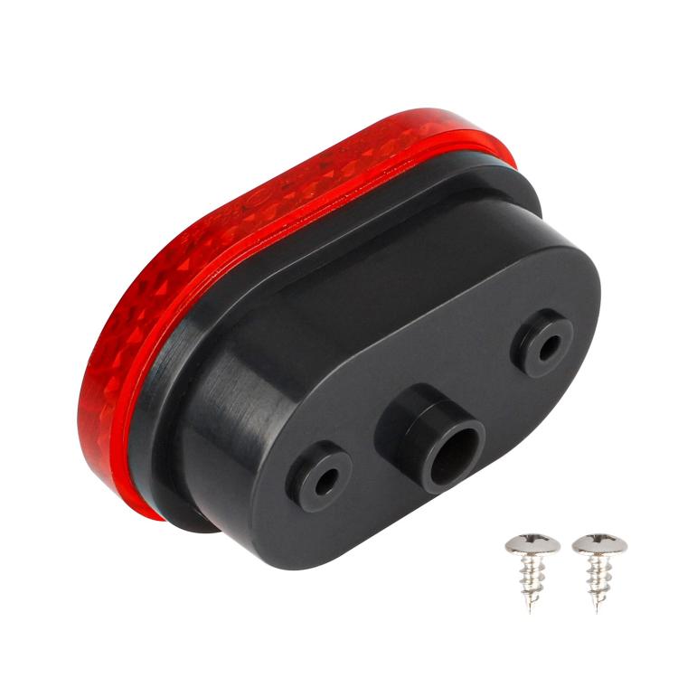 Red oval taillight lens with black housing, side view with mounting screws
