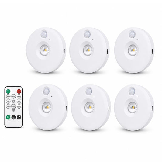 Group of six white cat-eye night lights with built-in motion sensors