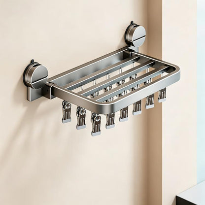 Stainless steel suction cup folding drying rack with multiple clothespins for underwear