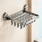 Wall-mounted stainless steel suction cup folding drying rack with multiple clothespins