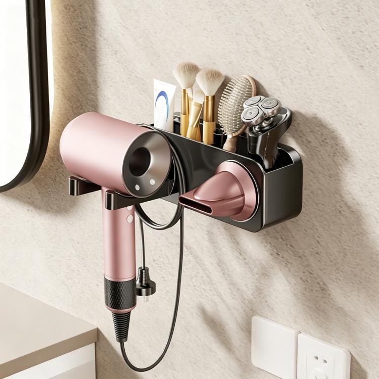 Suction-cup hair dryer wall rack holding pink dryer and grooming tools with black cradle