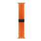 Orange knitted nylon watch band laid flat with a black magnetic buckle