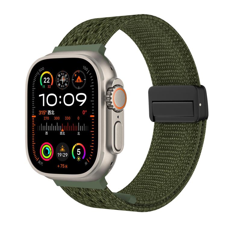 Army green knitted nylon watch band with a black magnetic buckle, shown on a watch