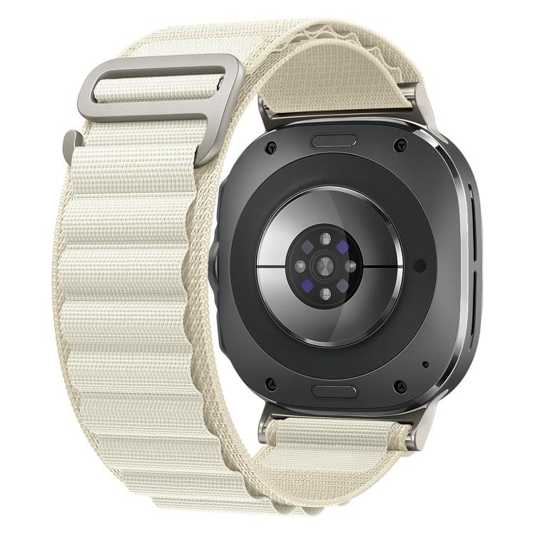 Cream nylon loop watch band with silver buckle, shown attached to a smartwatch