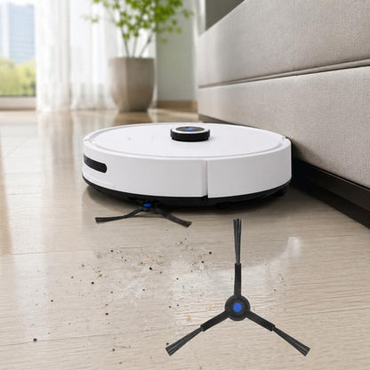 Robot vacuum with replacement side brush assembly attached on hardwood floor