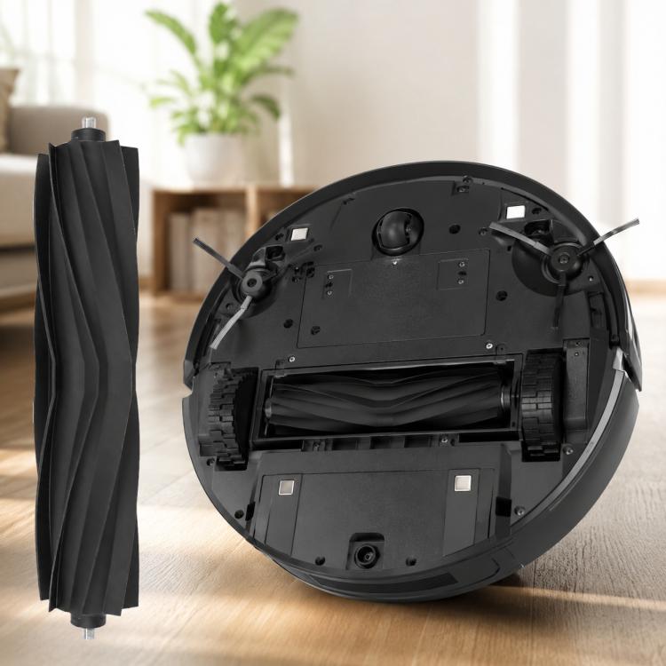 Underside of robotic vacuum showing main brush compartment and side brush area