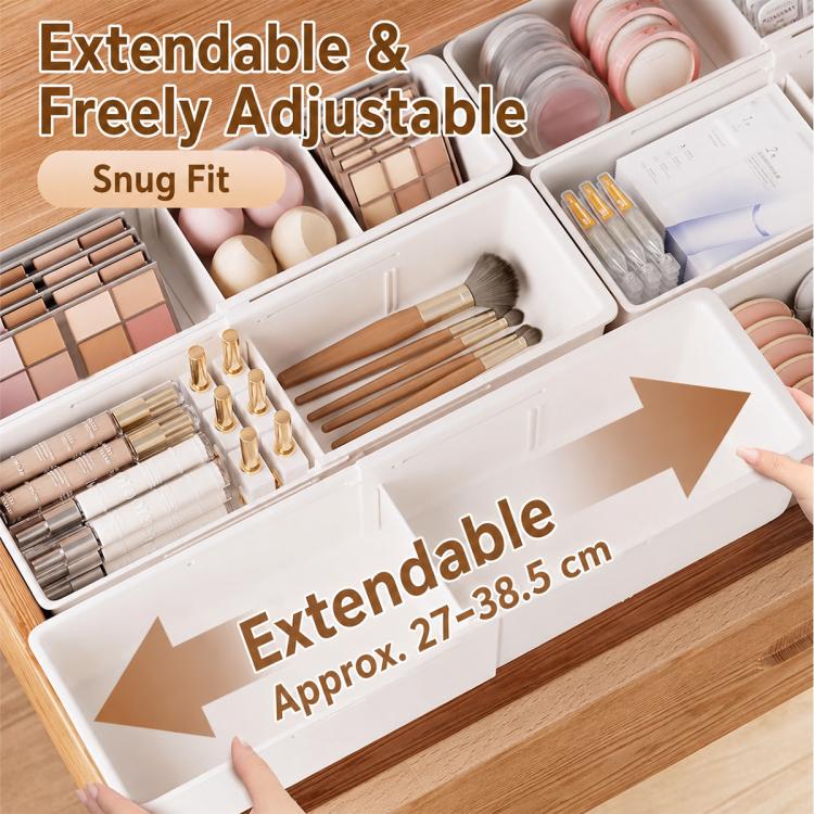 White adjustable expandable drawer organizer tray with segmented sections for skincare items