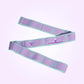 Purple yoga resistance band with numbered segments and printed stretching pose graphics