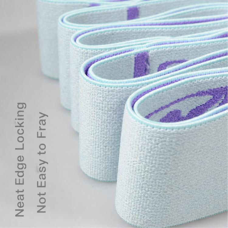Stacked resistance bands with soft fabric loop edges and purple printed icons, light blue
