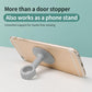 Grey suction cup door handle bumper stand holding a phone in a hands-free position
