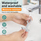 Grey waterproof and washable suction cup door handle bumper pad being rinsed with water