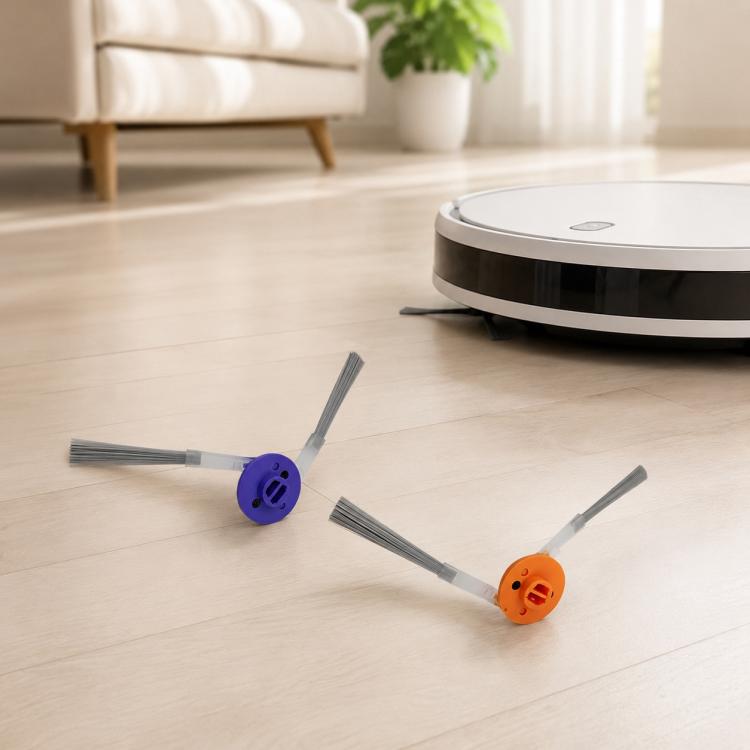 Robot vacuum showing two side brushes in orange and purple