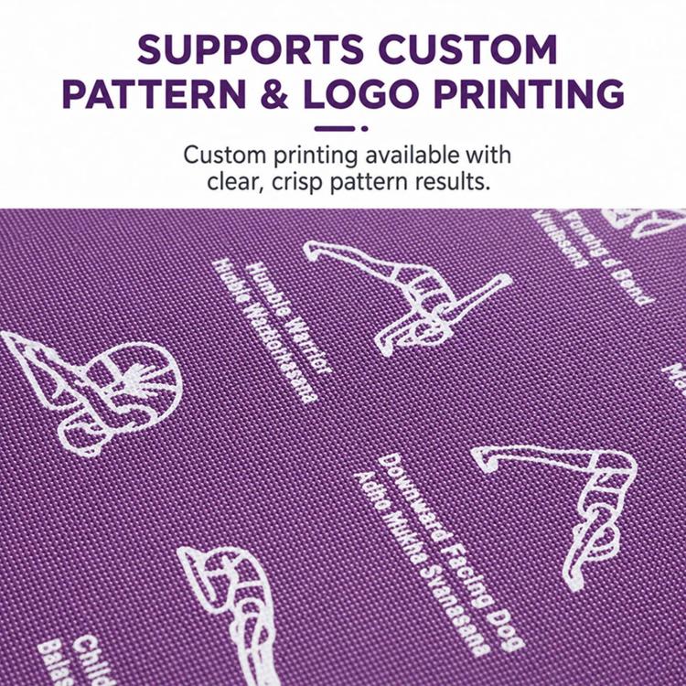 Purple yoga mat close-up with white printed pose icons and textured surface detail
