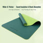 Wider fitness mat with dual colors: teal base and light green top layer, laid flat.