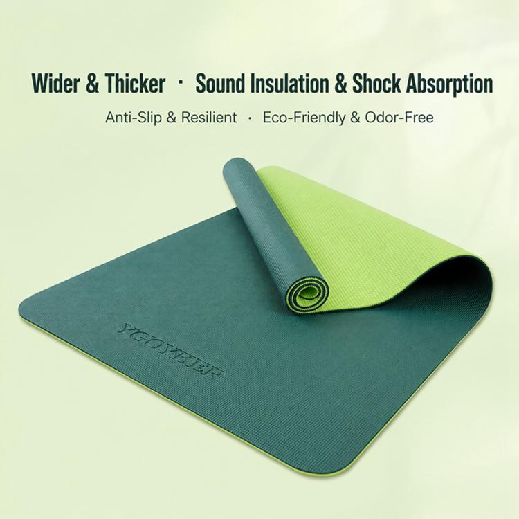 Wider fitness mat with dual colors: teal base and light green top layer, laid flat.
