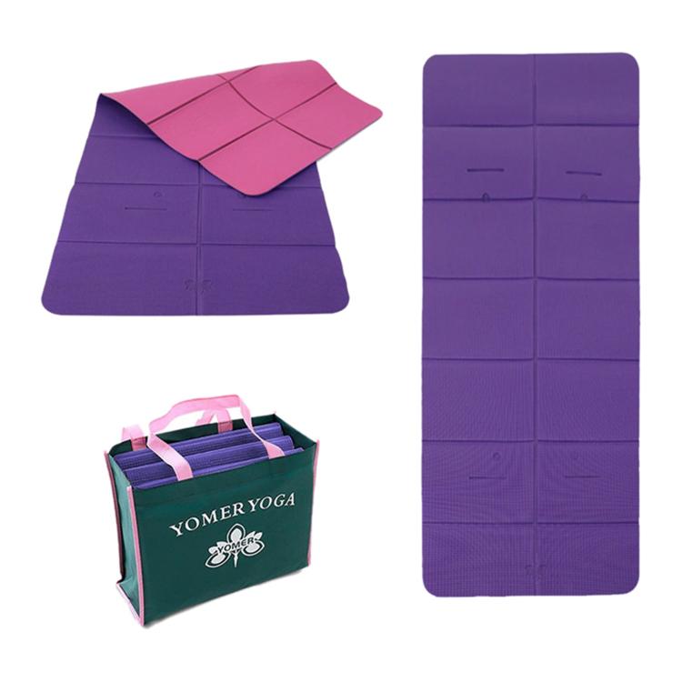 Foldable travel yoga mat in purple with pink fold-over cover