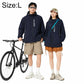 Sun protection coat in dark blue with hood and front zipper, worn with shorts.