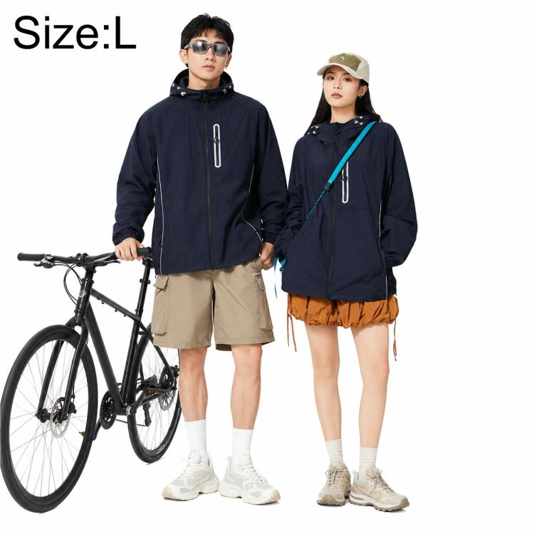 Sun protection coat in dark blue with hood and front zipper, worn with shorts.