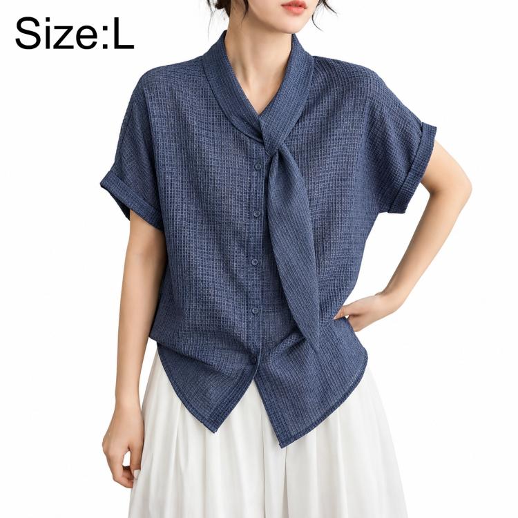 Women’s tie-neck button-front blouse in textured dark blue, model wearing size L.