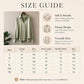 Green satin long-sleeve blouse on hanger with size guide