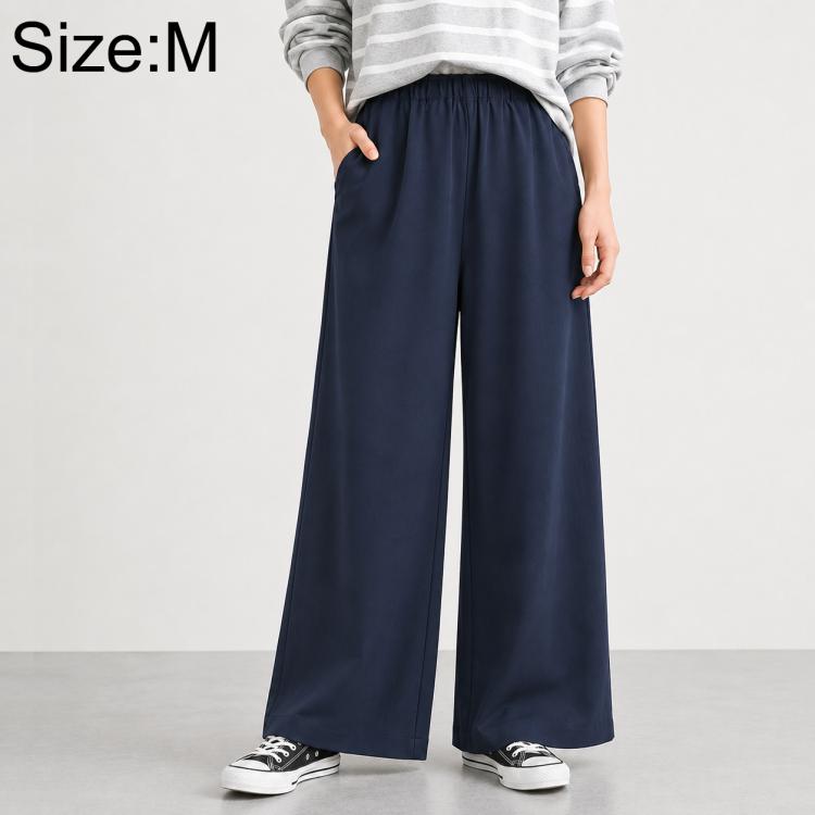 High-waisted wide-leg women’s pants with elastic waist, solid navy blue.