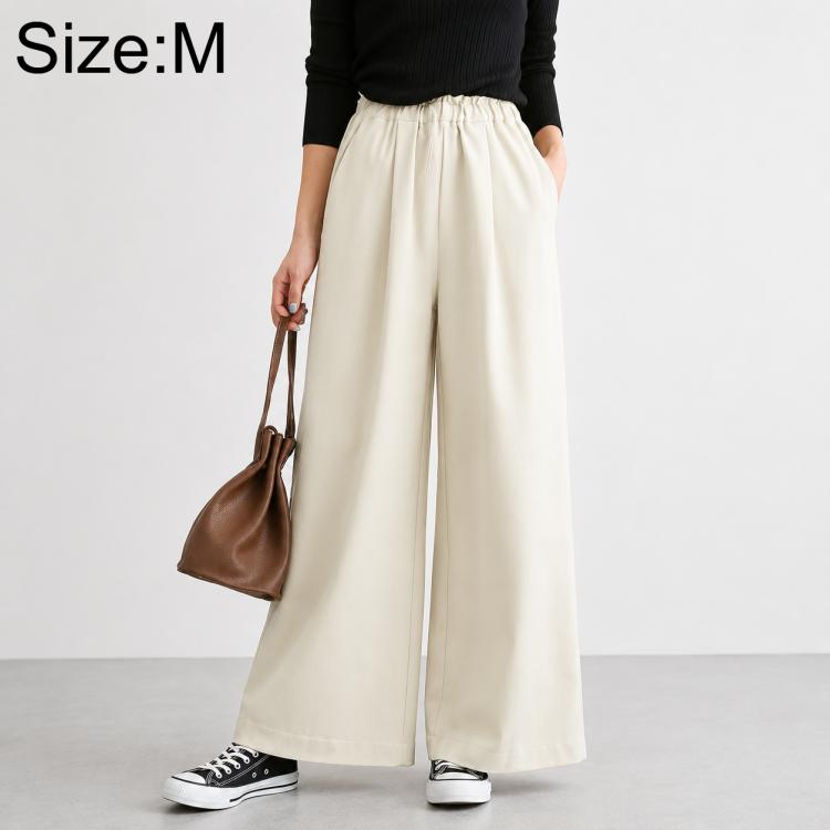 High-waisted wide-leg women’s pants, off-white, elastic waistband, size M