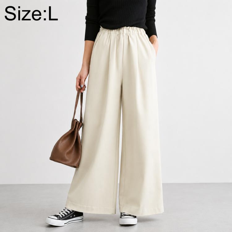 High-waisted wide-leg women’s pants, off-white, elastic waistband, size L