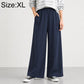 High-waisted wide-leg women’s pants with elastic waist, solid navy blue.