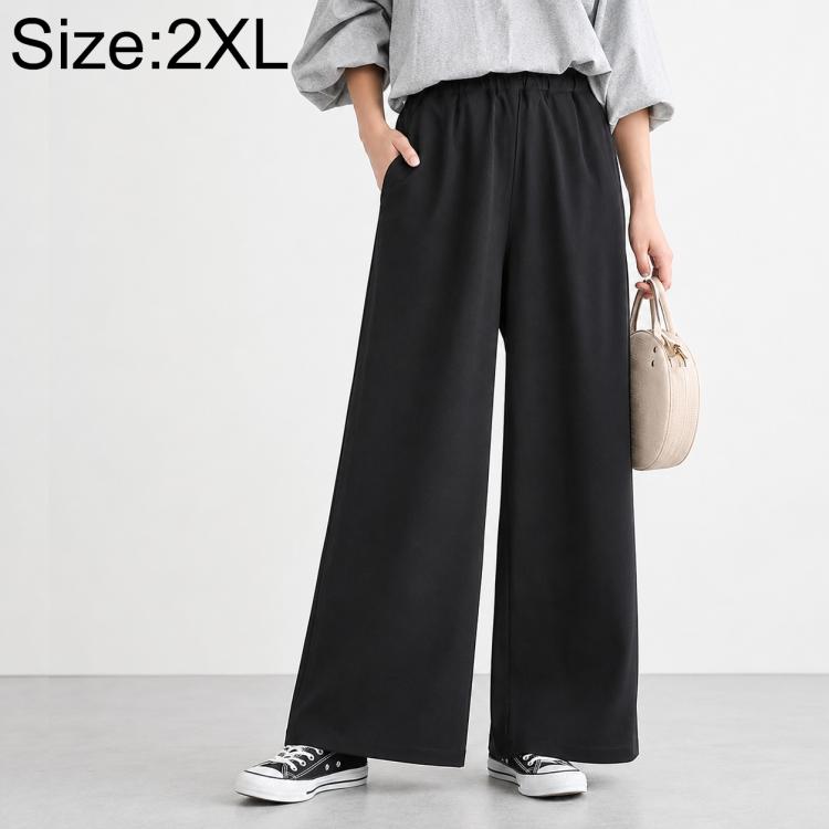 High-waisted wide-leg women’s pants with elastic waist, solid black.