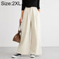 High-waisted wide-leg women’s pants, off-white, elastic waistband, size 2XL