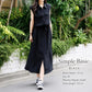 Women’s sleeveless black shirt dress with lapel collar, button front, tie waist