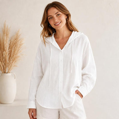 White hooded linen coat with long sleeves, button front, and drawstring ties