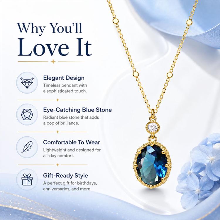 Gold-tone oval pendant necklace with blue center stone and round clear accent