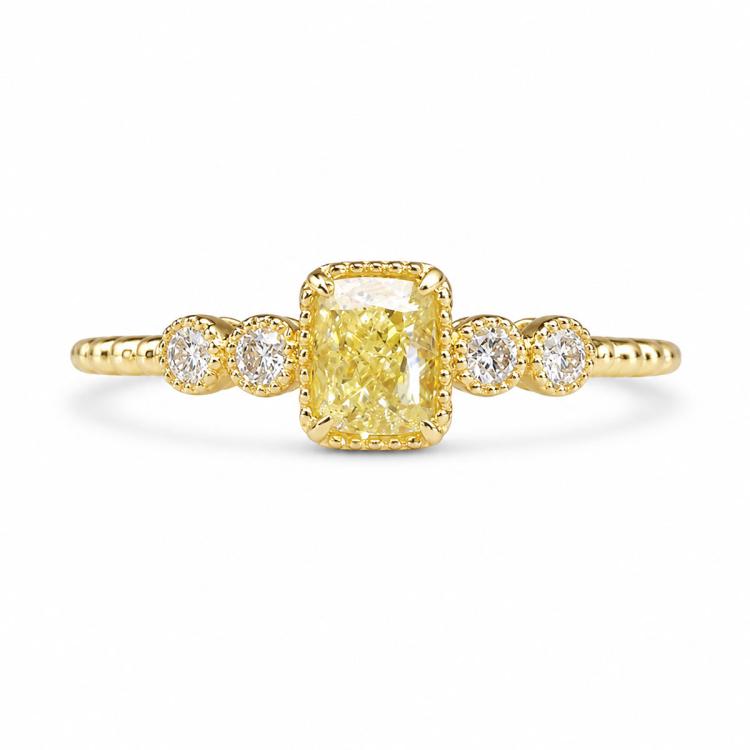 Gold-tone geometric square ring with yellow center stone and four clear round stones.