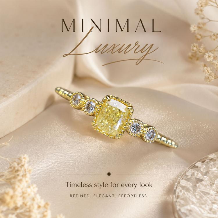 Gold-tone geometric ring with square yellow center stone and round clear side stones.