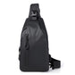 Black waterproof-style sling bag with top grab handle and zip front pocket.