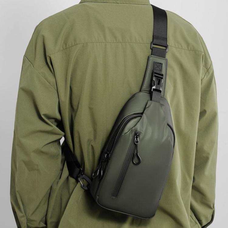 Gray crossbody chest sling bag with adjustable strap and front vertical zip pocket.
