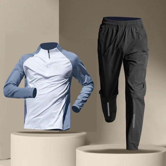 Men's athletic set: white and light blue half-zip long-sleeve top with black jogger pants