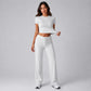 Women’s gray crop top with crew neck and wide-leg drawstring pants, front view