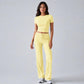 Women’s yellow short-sleeve crop top and high-waist drawstring lounge pants set