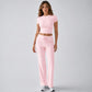 Women’s light pink short-sleeve crop top and drawstring wide-leg pants set, two-piece