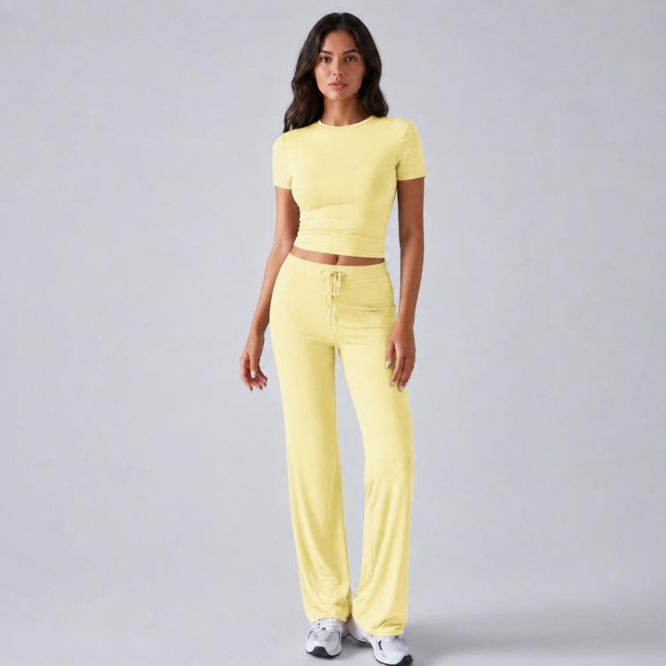 Women’s yellow short-sleeve crop top and high-waist drawstring lounge pants set