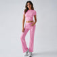 Women’s light pink short-sleeve crop top and wide-leg pants set with elastic drawstring