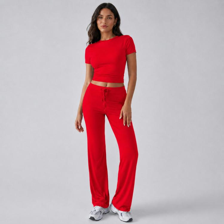 Women’s red crop top and wide-leg pants outfit, short sleeves, front seam detailing